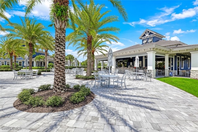 view of property's community featuring a patio