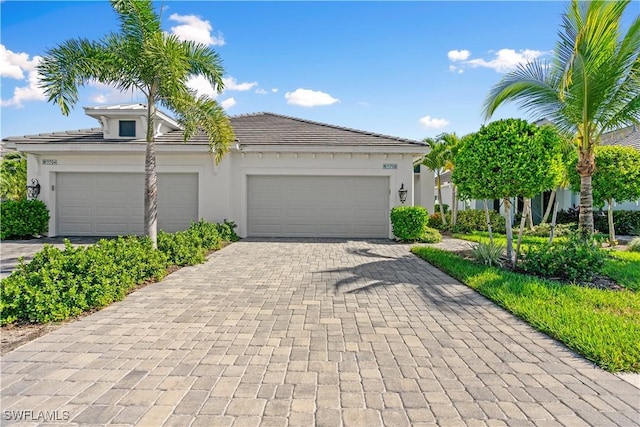 view of front of property with a garage