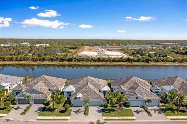 drone / aerial view with a water view