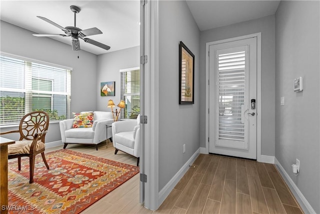 entryway featuring ceiling fan