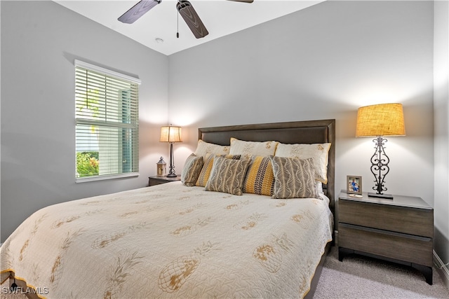 bedroom with ceiling fan and carpet flooring