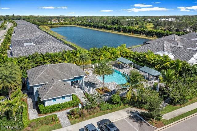 birds eye view of property with a water view