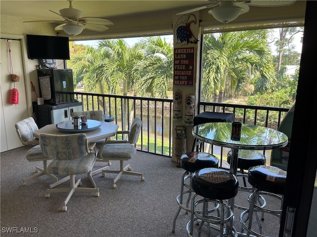 balcony featuring ceiling fan