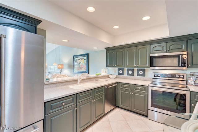 kitchen with light stone countertops, sink, appliances with stainless steel finishes, and light tile patterned flooring