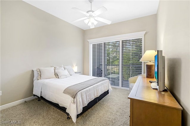 carpeted bedroom featuring access to exterior and ceiling fan