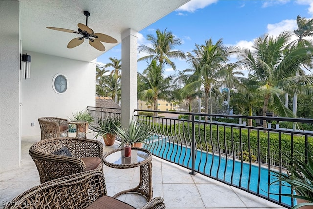 balcony featuring ceiling fan