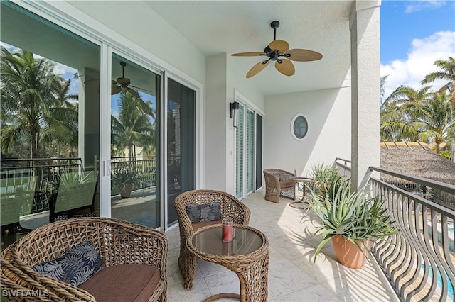 balcony featuring ceiling fan