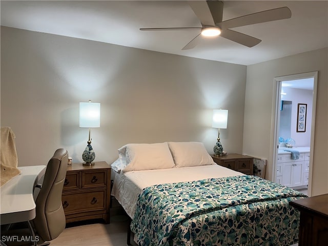 bedroom with light hardwood / wood-style flooring, connected bathroom, and ceiling fan