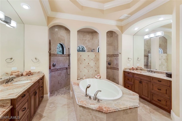 bathroom featuring vanity, crown molding, and independent shower and bath