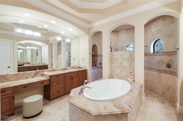 bathroom featuring vanity, ornamental molding, and plus walk in shower