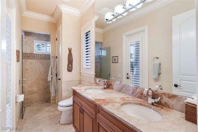 bathroom featuring an enclosed shower, toilet, vanity, crown molding, and tile patterned flooring