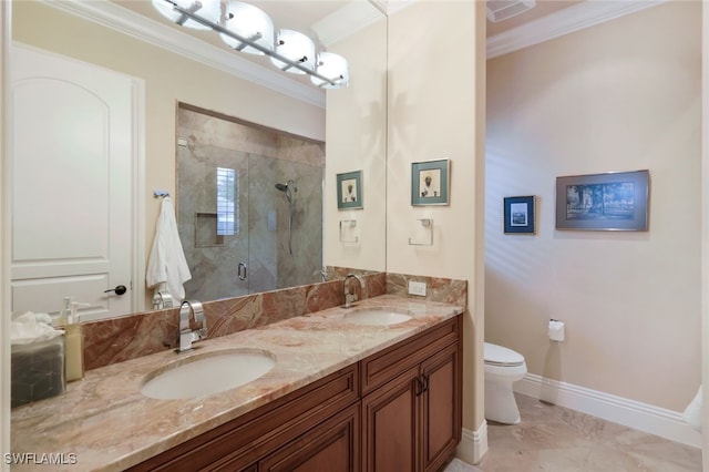 bathroom featuring vanity, crown molding, a shower with shower door, and toilet