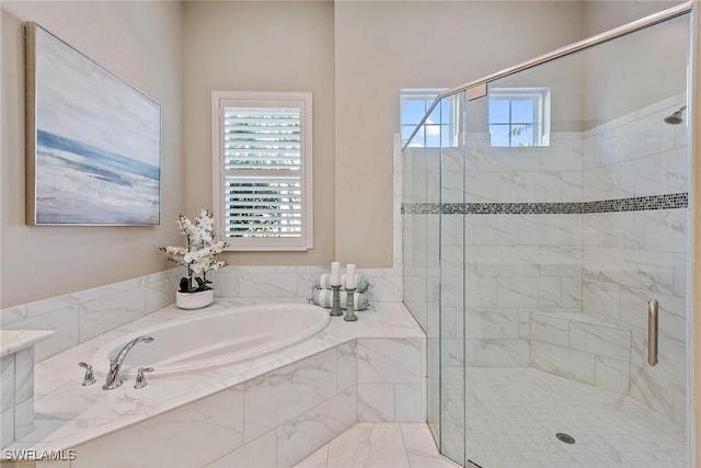 full bathroom with a garden tub and a stall shower
