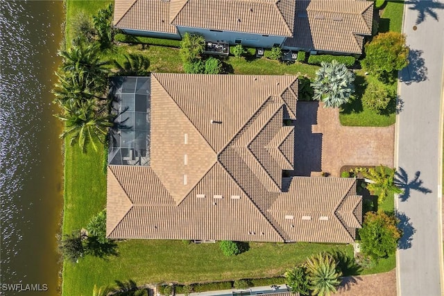 bird's eye view with a water view
