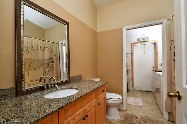 full bathroom with toilet, tile patterned flooring, and vanity