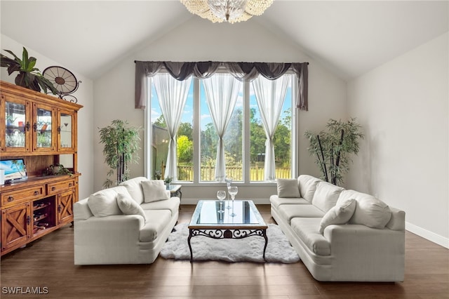 living room with dark hardwood / wood-style floors and high vaulted ceiling