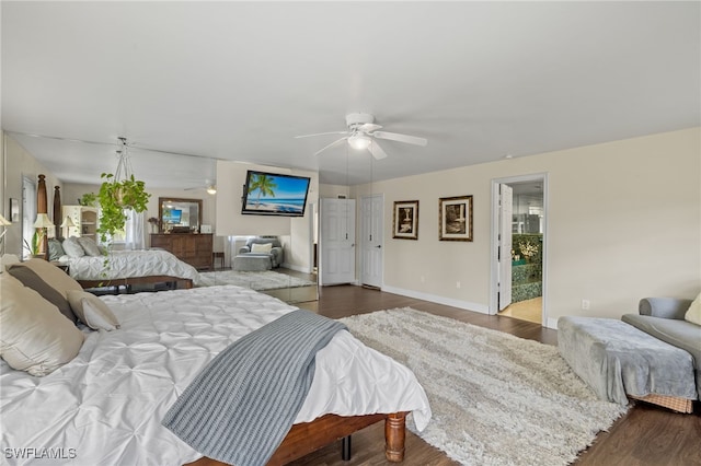 bedroom featuring dark wood-type flooring and ceiling fan