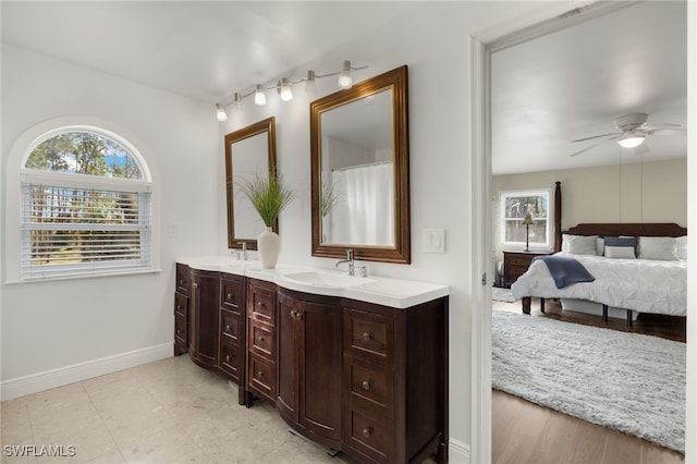 bathroom with vanity and ceiling fan