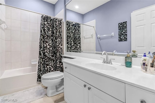 bathroom featuring shower / bathtub combination with curtain, vanity, and toilet