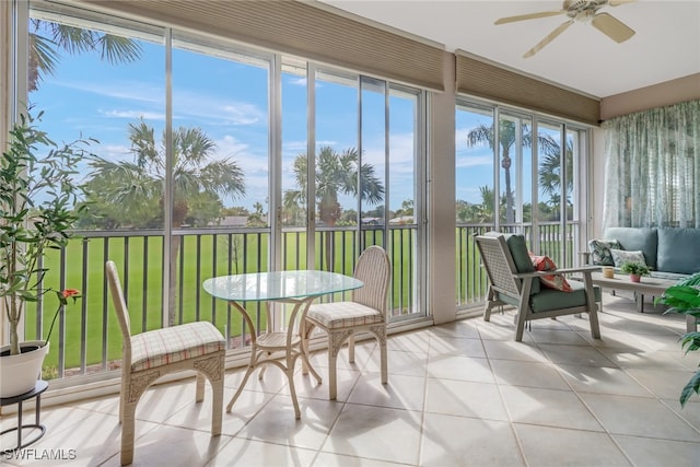 sunroom / solarium with ceiling fan