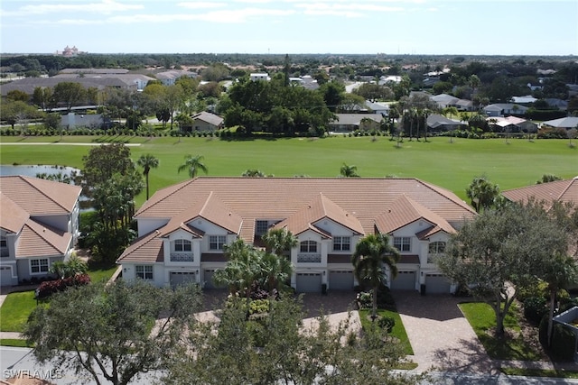 birds eye view of property with a residential view, golf course view, and a water view