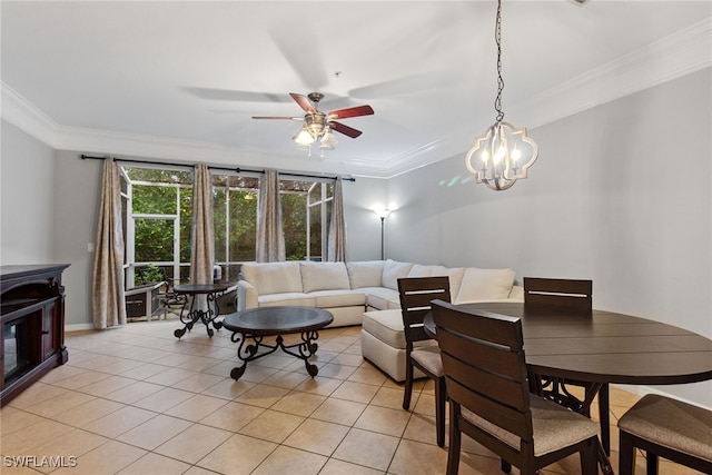 tiled living room with crown molding and ceiling fan with notable chandelier