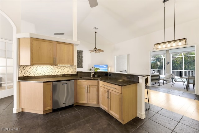 kitchen with kitchen peninsula, sink, stainless steel dishwasher, and ceiling fan