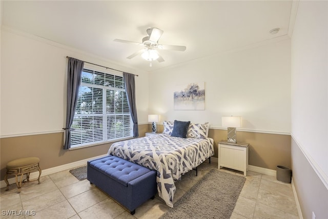 bedroom with crown molding and ceiling fan