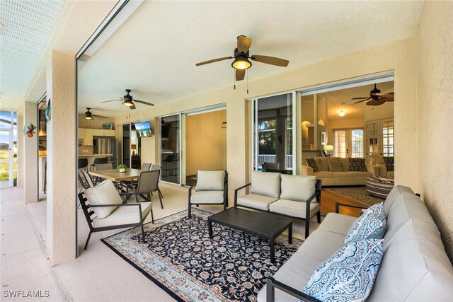 view of patio / terrace featuring an outdoor hangout area and ceiling fan