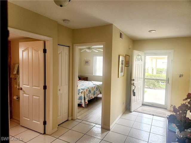 interior space featuring ceiling fan