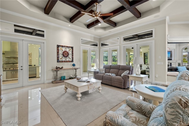 living room with french doors, beam ceiling, coffered ceiling, and light tile patterned floors