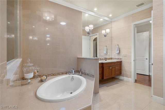 bathroom with a bathtub, crown molding, tile patterned flooring, and vanity