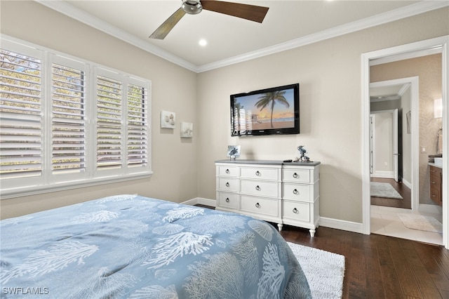 bedroom with connected bathroom, ceiling fan, dark wood-type flooring, and ornamental molding