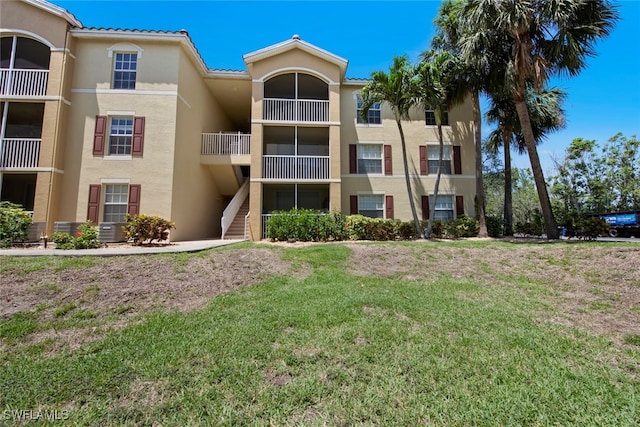 view of property featuring central AC unit