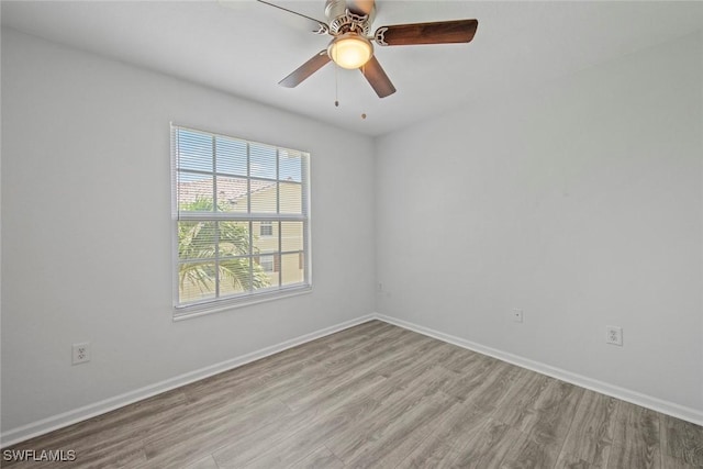 4105 Residence Dr Unit 718, Fort Myers, FL 33901 - empty room featuring light wood-type flooring, baseboards, and a ceiling fan