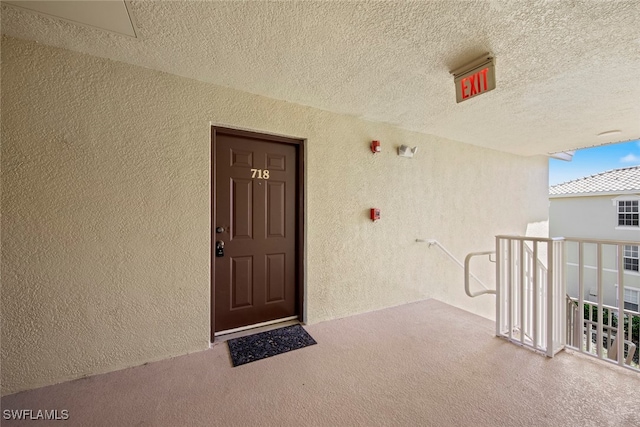 doorway to property with a balcony