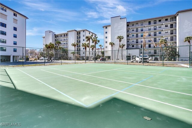 6893 Estero Blvd Unit 456, Fort Myers Beach, FL 33931 - view of tennis court with fence and community basketball court