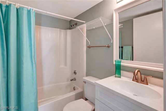 full bathroom featuring vanity, toilet, and shower / bath combination with curtain