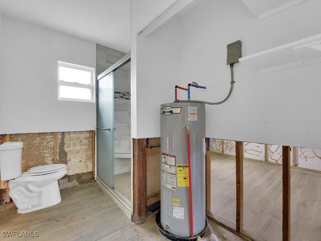 utility room with electric water heater