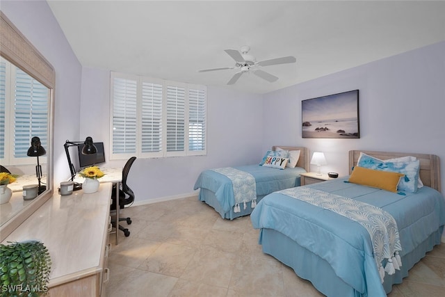 bedroom with ceiling fan and multiple windows