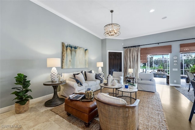 living room featuring ornamental molding and a notable chandelier