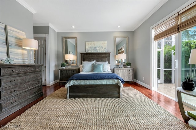 bedroom with dark hardwood / wood-style floors and ornamental molding