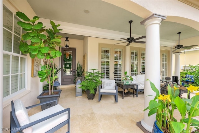 view of patio / terrace featuring an outdoor hangout area, ceiling fan, and french doors