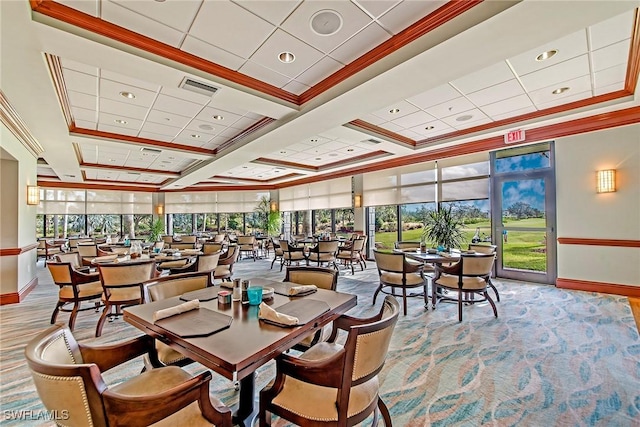 dining area featuring crown molding, a raised ceiling, coffered ceiling, and expansive windows