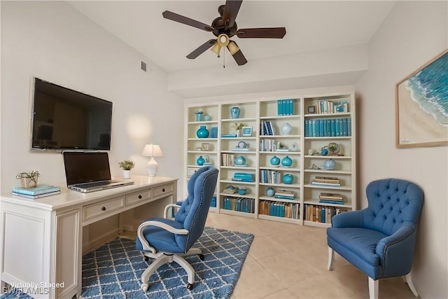 tiled office featuring ceiling fan