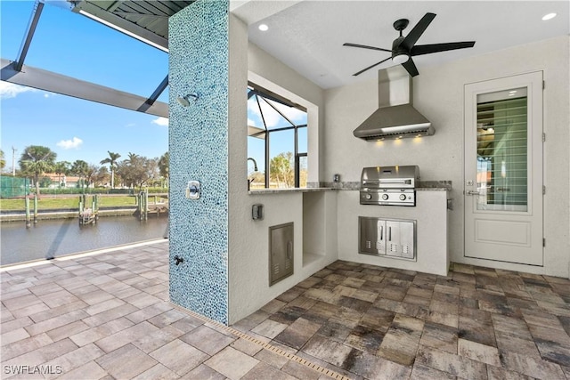 view of patio with ceiling fan, grilling area, and area for grilling