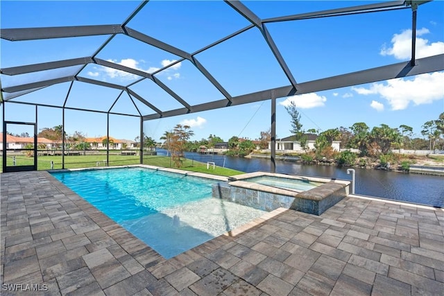 view of swimming pool with an in ground hot tub, a water view, a lanai, a yard, and a patio