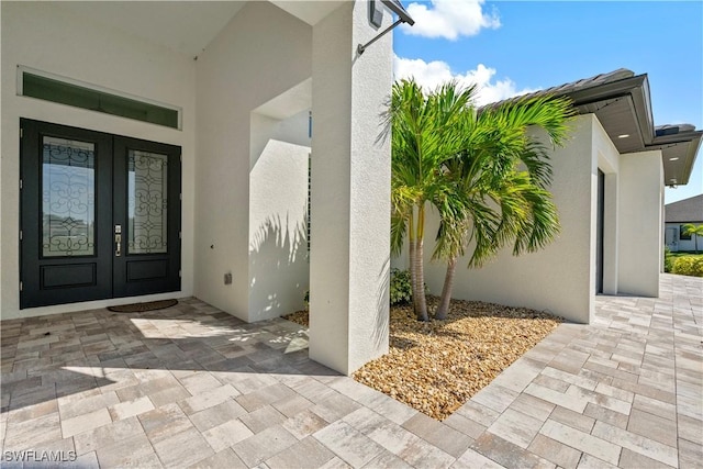 view of exterior entry with french doors