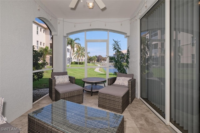 sunroom / solarium with ceiling fan