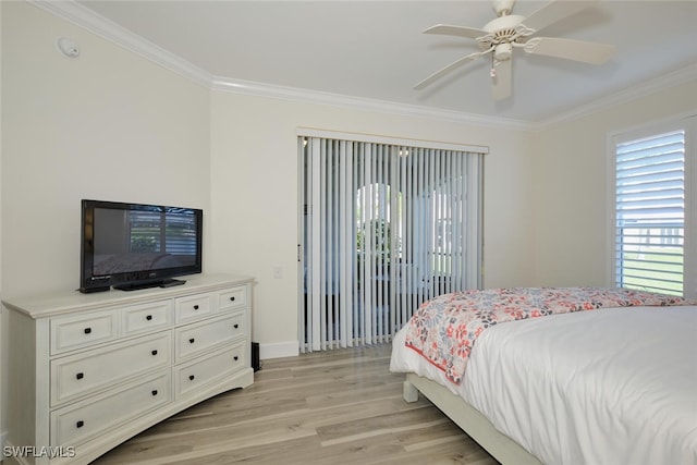 bedroom with ornamental molding, light hardwood / wood-style floors, and ceiling fan